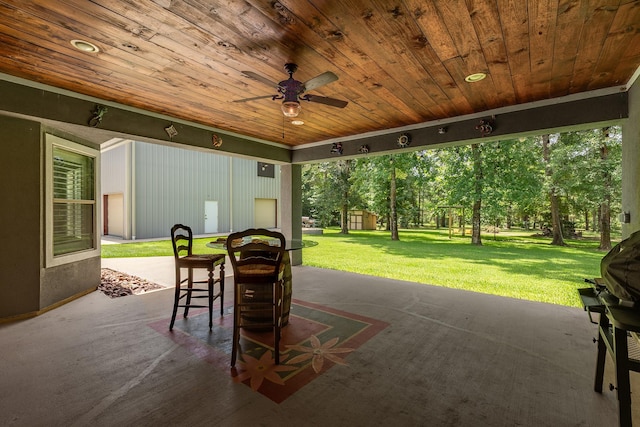 27724 Colapis Dr, Splendora, TX 77372 - view of patio featuring ceiling fan and a storage unit