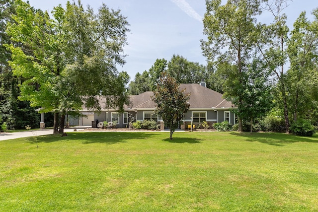 27724 Colapis Dr, Splendora, TX 77372 - view of front of property featuring a front lawn