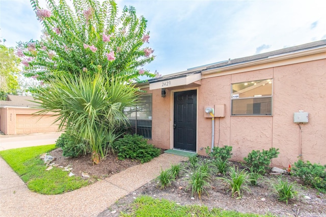2429 Briarwest Blvd, Houston, TX 77077 - view of exterior entry featuring stucco siding