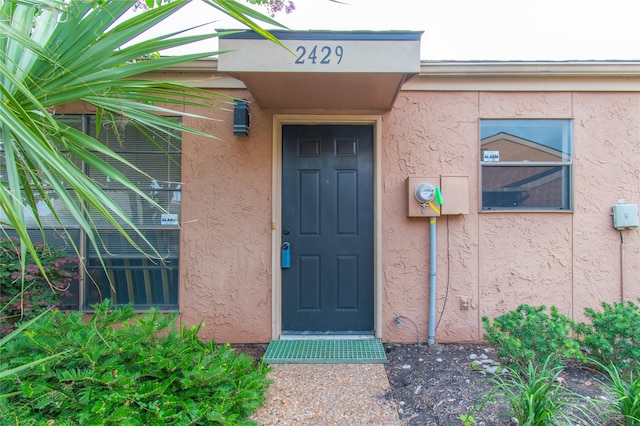 2429 Briarwest Blvd, Houston, TX 77077 - property entrance featuring stucco siding