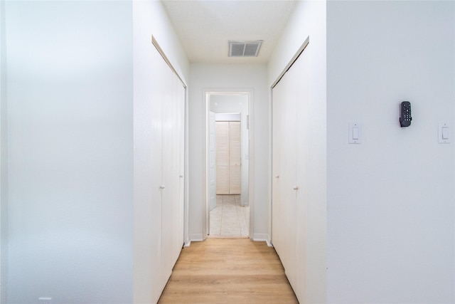 2429 Briarwest Blvd, Houston, TX 77077 - hallway with light wood-style flooring