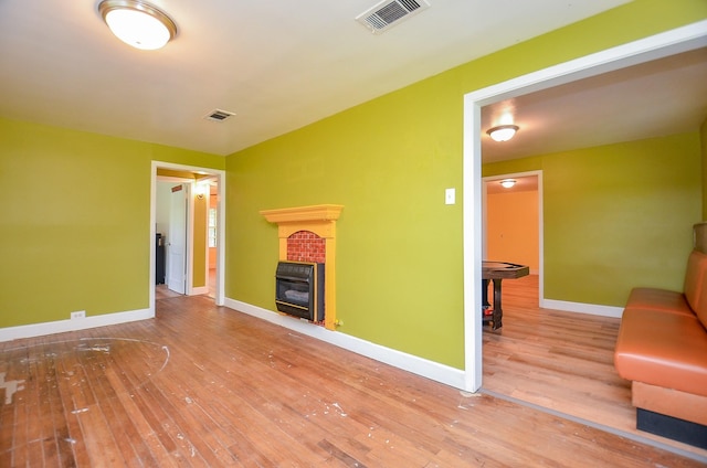 1700 Marilyn St, Rosenberg, TX 77471 - living area featuring wood-type flooring and a fireplace