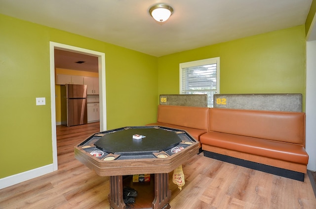 1700 Marilyn St, Rosenberg, TX 77471 - rec room featuring wood finished floors and baseboards