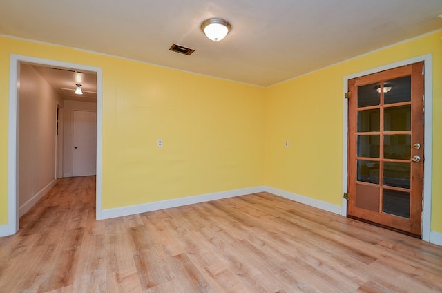 1700 Marilyn St, Rosenberg, TX 77471 - unfurnished room featuring light wood-style floors and crown molding