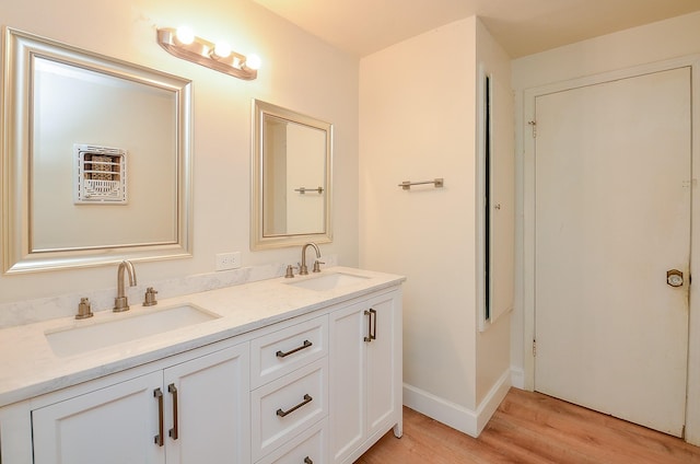 1700 Marilyn St, Rosenberg, TX 77471 - full bathroom with wood finished floors and double vanity