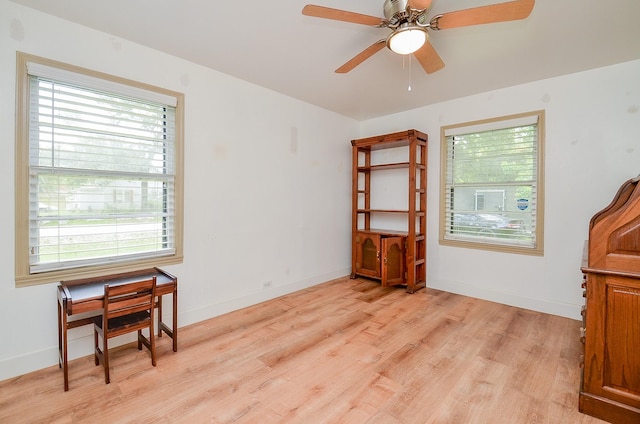 1700 Marilyn St, Rosenberg, TX 77471 - office space with light wood finished floors and ceiling fan