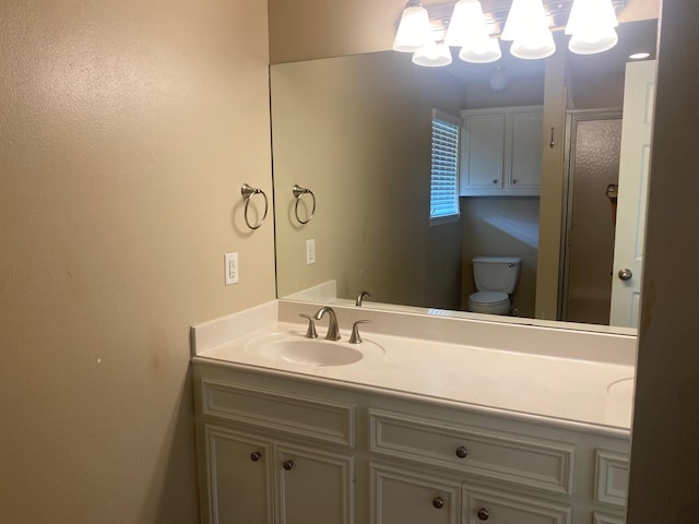 6220 Queenswood Ln, Houston, TX 77008 - bathroom featuring vanity, a stall shower, and a chandelier