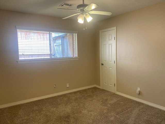 6220 Queenswood Ln, Houston, TX 77008 - carpeted empty room featuring a ceiling fan and baseboards