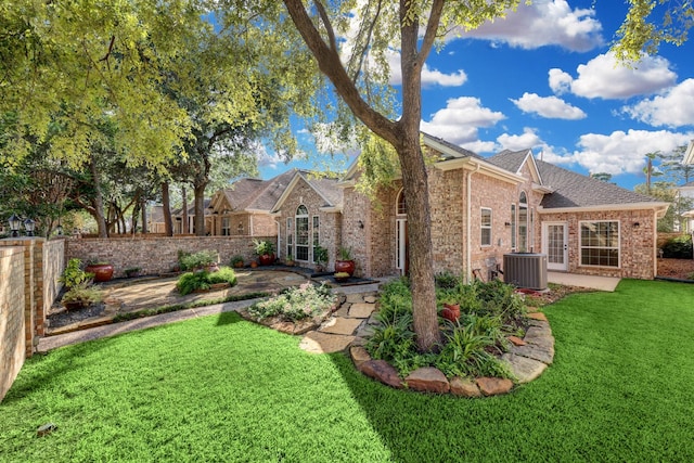 5022 Coral Gables Dr, Houston, TX 77069 - back of property with a patio area, french doors, and brick siding