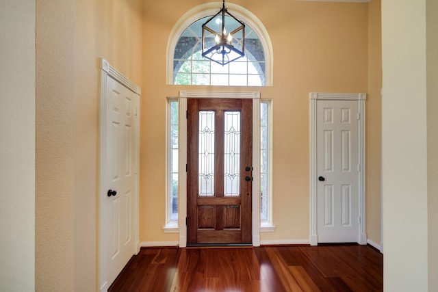 5022 Coral Gables Dr, Houston, TX 77069 - foyer with a chandelier, dark wood finished floors, and a high ceiling