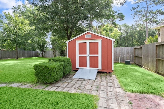 31406 Spica St, Tomball, TX 77375 - view of shed featuring a fenced backyard