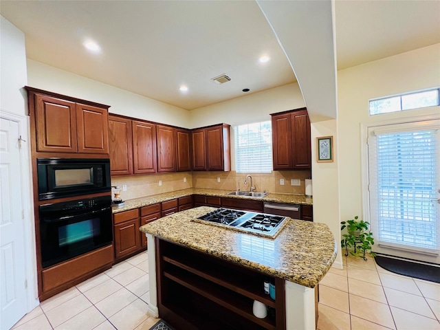8018 Stoneyway Dr, Houston, TX 77040 - kitchen featuring black appliances, open shelves, backsplash, light stone countertops, and light tile patterned floors