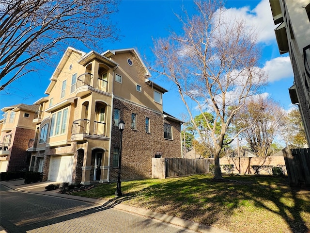 8018 Stoneyway Dr, Houston, TX 77040 - view of property featuring an attached garage and driveway