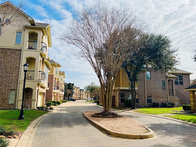 8018 Stoneyway Dr, Houston, TX 77040 - view of street with a residential view, curbs, and street lights