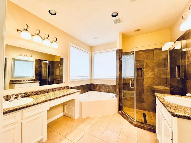 8018 Stoneyway Dr, Houston, TX 77040 - full bathroom with a garden tub, two vanities, a stall shower, and plenty of natural light