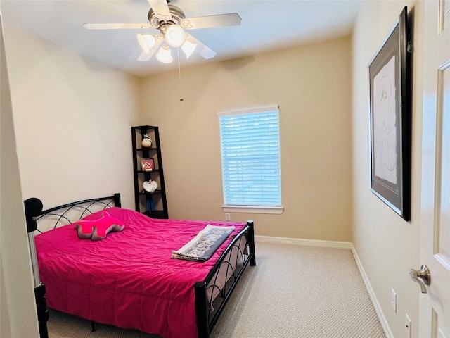 8018 Stoneyway Dr, Houston, TX 77040 - carpeted bedroom with baseboards and a ceiling fan