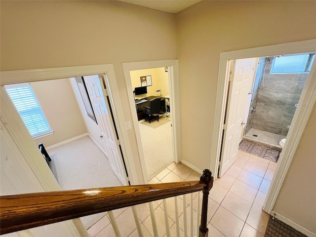 8018 Stoneyway Dr, Houston, TX 77040 - corridor with light tile patterned flooring and baseboards