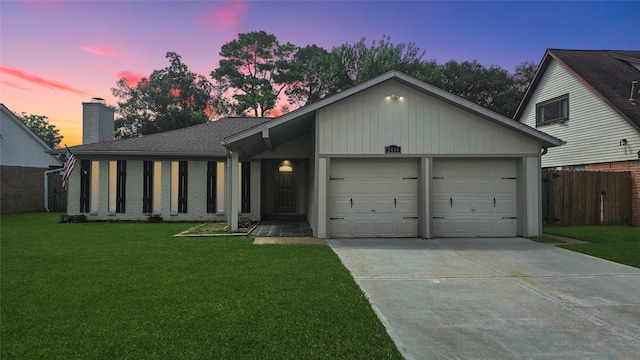 2414 Stillmeadow Dr, Missouri City, TX 77489 - view of front of property with an attached garage, driveway, a chimney, and brick siding