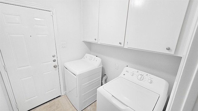 2414 Stillmeadow Dr, Missouri City, TX 77489 - laundry area featuring separate washer and dryer and cabinet space