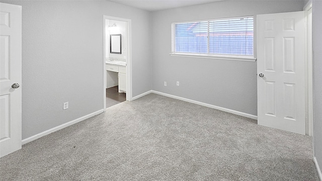 2414 Stillmeadow Dr, Missouri City, TX 77489 - unfurnished bedroom with carpet flooring and connected bathroom