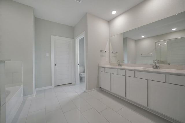 2556 Newport Breeze Dr, Katy, TX 77493 - full bath with double vanity, a bath, a stall shower, and tile patterned flooring