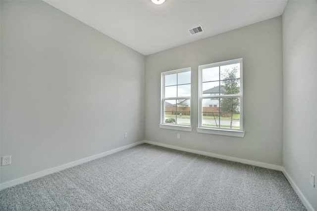 2556 Newport Breeze Dr, Katy, TX 77493 - spare room featuring plenty of natural light and carpet
