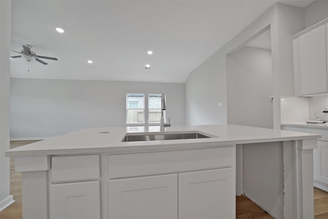2556 Newport Breeze Dr, Katy, TX 77493 - kitchen featuring light countertops, white cabinets, a ceiling fan, recessed lighting, and a kitchen island with sink