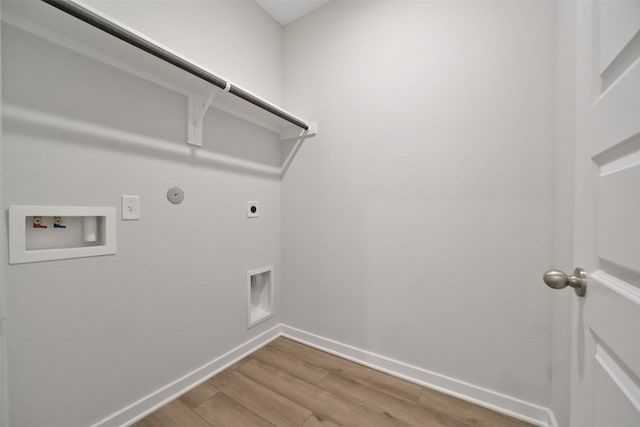 2556 Newport Breeze Dr, Katy, TX 77493 - laundry room featuring hookup for an electric dryer, hookup for a washing machine, gas dryer hookup, and wood finished floors