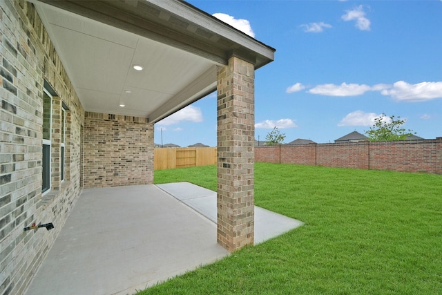2556 Newport Breeze Dr, Katy, TX 77493 - fenced backyard featuring a patio area