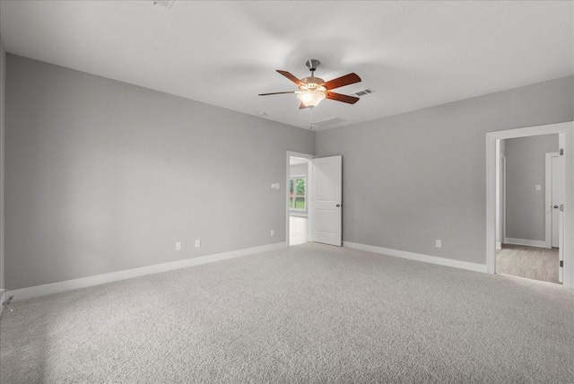 5000 Boreas Dr, Alvin, TX 77511 - unfurnished bedroom with carpet floors and a ceiling fan