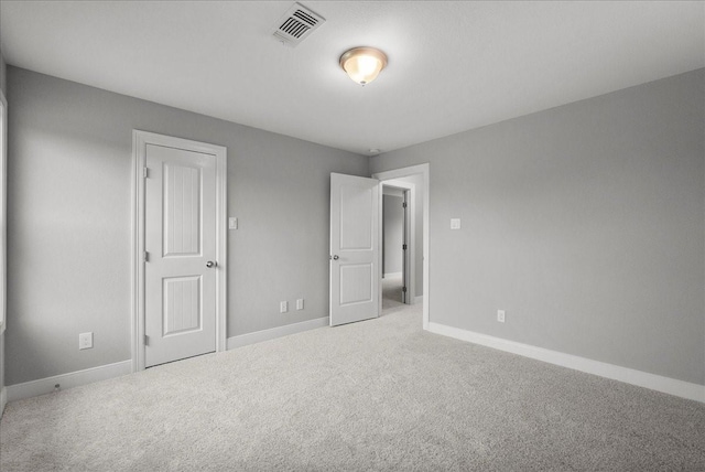 5000 Boreas Dr, Alvin, TX 77511 - unfurnished bedroom featuring carpet flooring and baseboards