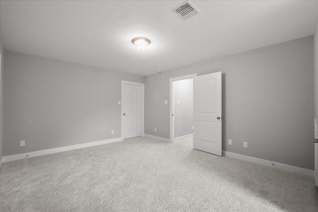 5000 Boreas Dr, Alvin, TX 77511 - unfurnished bedroom featuring light colored carpet and baseboards