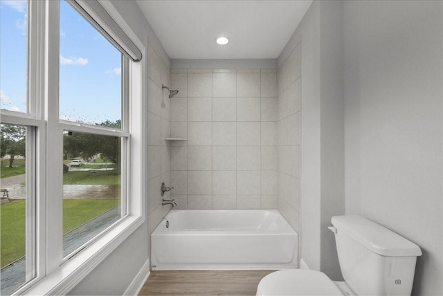 5000 Boreas Dr, Alvin, TX 77511 - full bath with wood finished floors, bathing tub / shower combination, and recessed lighting