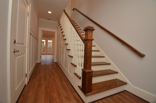 1605 Cohn St, Houston, TX 77007 - staircase featuring wood finished floors, recessed lighting, and crown molding