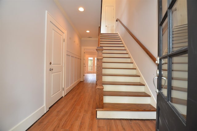 1605 Cohn St, Houston, TX 77007 - staircase featuring ornamental molding, recessed lighting, and wood finished floors
