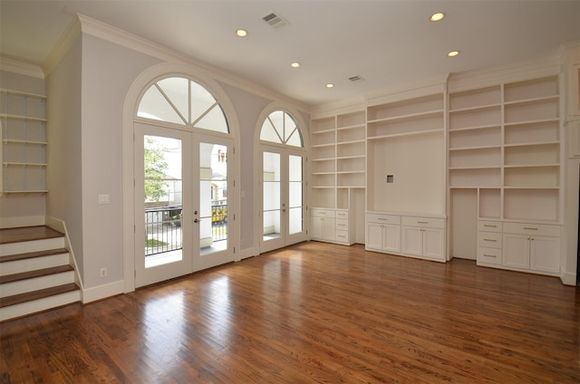 1605 Cohn St, Houston, TX 77007 - unfurnished living room featuring french doors, crown molding, recessed lighting, dark wood-style flooring, and built in shelves