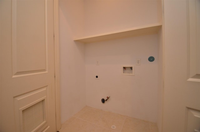 1605 Cohn St, Houston, TX 77007 - washroom with gas dryer hookup, hookup for a washing machine, tile patterned floors, and electric dryer hookup