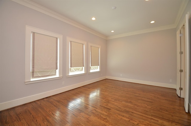 1605 Cohn St, Houston, TX 77007 - spare room featuring wood finished floors, crown molding, and recessed lighting