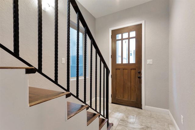 1025 W 21st St Unit C, Houston, TX 77008 - foyer with stairway and a textured wall