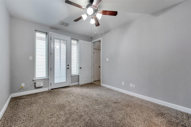 1025 W 21st St Unit C, Houston, TX 77008 - unfurnished bedroom with carpet, access to exterior, and ceiling fan