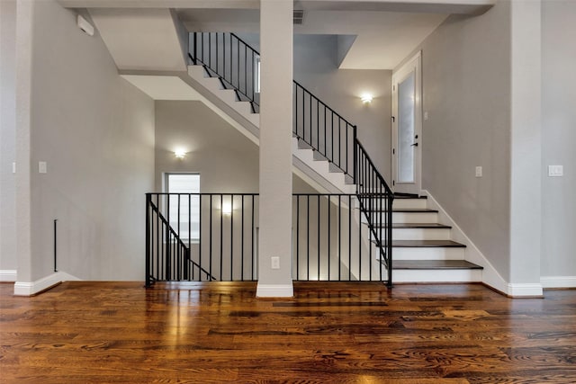 1025 W 21st St Unit C, Houston, TX 77008 - stairs featuring wood finished floors and a towering ceiling