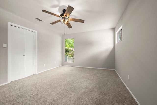 116 Harbour Ln, Coldspring, TX 77331 - unfurnished bedroom with carpet, a closet, and ceiling fan