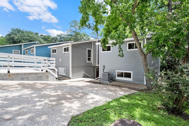 116 Harbour Ln, Coldspring, TX 77331 - back of property with a patio area