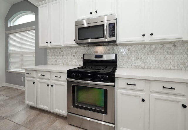10166 Hidden Creek Falls Ln, Brookshire, TX 77423 - kitchen featuring stainless steel appliances, tasteful backsplash, and light countertops