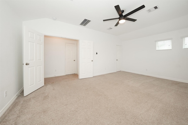 10166 Hidden Creek Falls Ln, Brookshire, TX 77423 - unfurnished bedroom featuring light carpet, lofted ceiling, and a ceiling fan