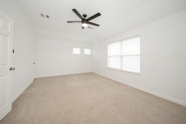 10166 Hidden Creek Falls Ln, Brookshire, TX 77423 - empty room with a ceiling fan and light carpet