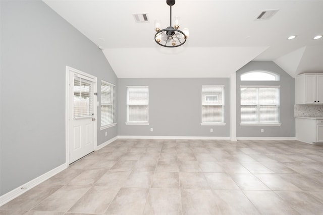 10166 Hidden Creek Falls Ln, Brookshire, TX 77423 - unfurnished dining area featuring vaulted ceiling, a chandelier, light tile patterned flooring, and recessed lighting