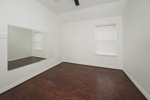 10166 Hidden Creek Falls Ln, Brookshire, TX 77423 - spare room featuring lofted ceiling, ceiling fan, and dark wood-style flooring