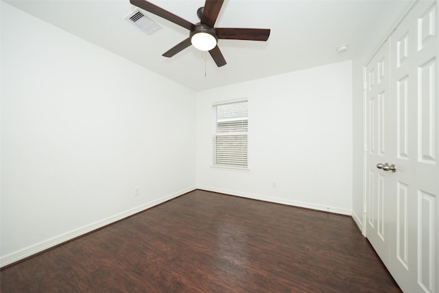 10166 Hidden Creek Falls Ln, Brookshire, TX 77423 - empty room with dark wood-type flooring, a ceiling fan, and a smoke detector