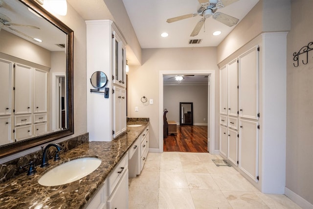17603 Hidden Forest Dr, Spring, TX 77379 - full bath with a ceiling fan, double vanity, and recessed lighting